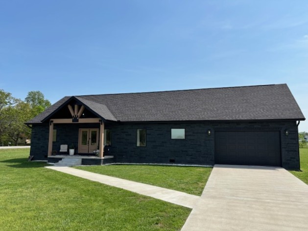 Pristine location!! This newly built, beautiful home is located on 1.5 acres in the North Ridge Estates just off of Ridgeway Loop. You will love the rustic touch throughout the home. The kitchen boasts leathered granite countertops with all Zline appliances. The kitchen has a beautiful island with a nice Zline microwave drawer. The living room features a custom rock fireplace with temperature controlled remote. Mohawk luxury vinyl is throughout the home. It has two covered porches to relax and a large back yard. There is lots of extra storage space in the attic which is accessed from the garage. You must see to appreciate all the added features of this home.