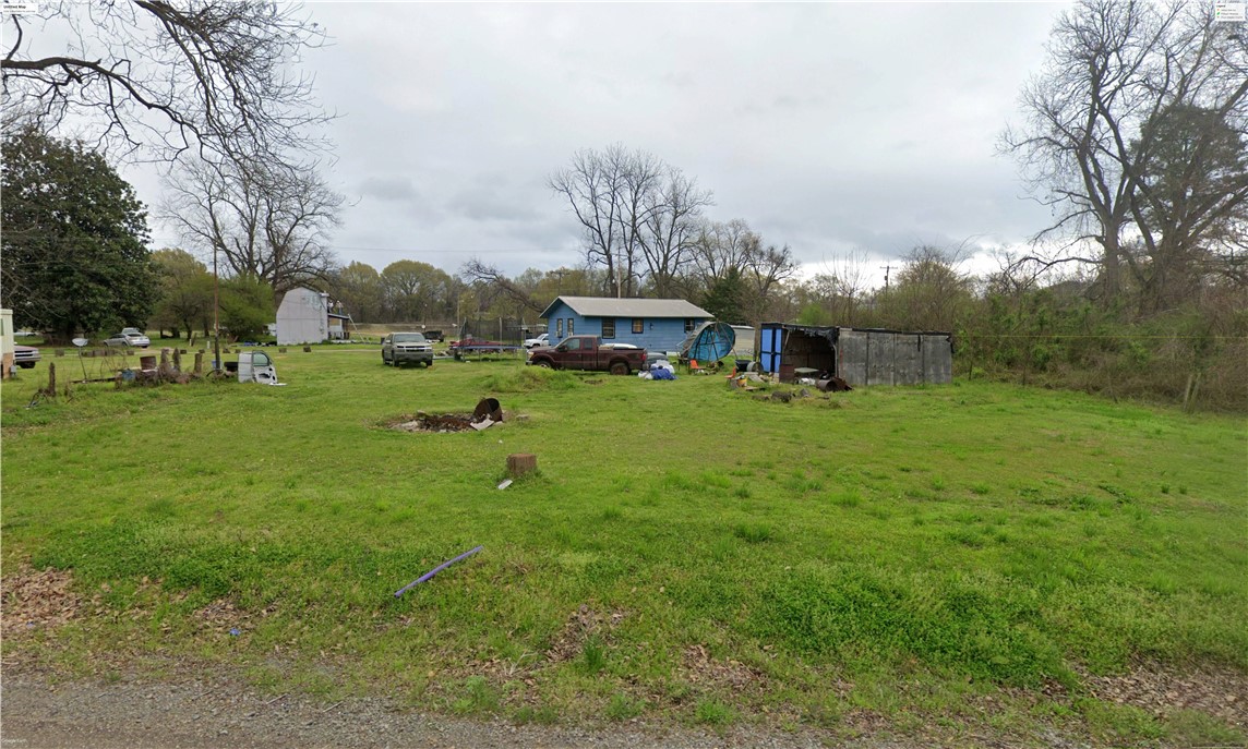 0.20 acre of land where you can build your dream home, move your mobile home or use as a weekend getaway! Conveniently located only 17 minutes from Texarkana, this property offers the best of both worlds: the quiet charm of Garland City paired with quick access to Texarkana's shopping, dining, and entertainment. This is the land you've been looking for! Buy it now before it's gone! GPS Coordinates*: SW: 33.362400, -93.710714; SE: 33.362397, -93.710553; NE: 33.362853, -93.710542; NW: 33.362853, -93.710706; *Property boundaries on images and GPS coordinates are only estimates. For exact boundaries, a survey should be done.