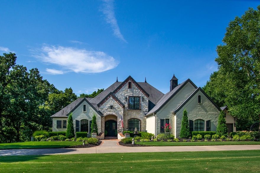 Builder's personal home with upgrades everywhere! This 4,550 Sq Ft home sits on a 2.47 acre lot backing up to the woods in the highly desired Talamore Subdivision. Enjoy the large lot with the outdoor kitchen and living area with outdoor fireplace, built in gas grill, hot tub and a custom salt water pool with rock waterfall and pool bathroom! Perfect upscale kitchen, formal sitting room, living room open to the kitchen, study with gas fireplace and formal dining perfect for any occasion. Custom trim work throughout, exposed brick, 4 garage bays, and hand scraped hardwood floors throughout. There is a full media room, custom wet bar area with lit bar top, projection screen, projector, and surround sound.