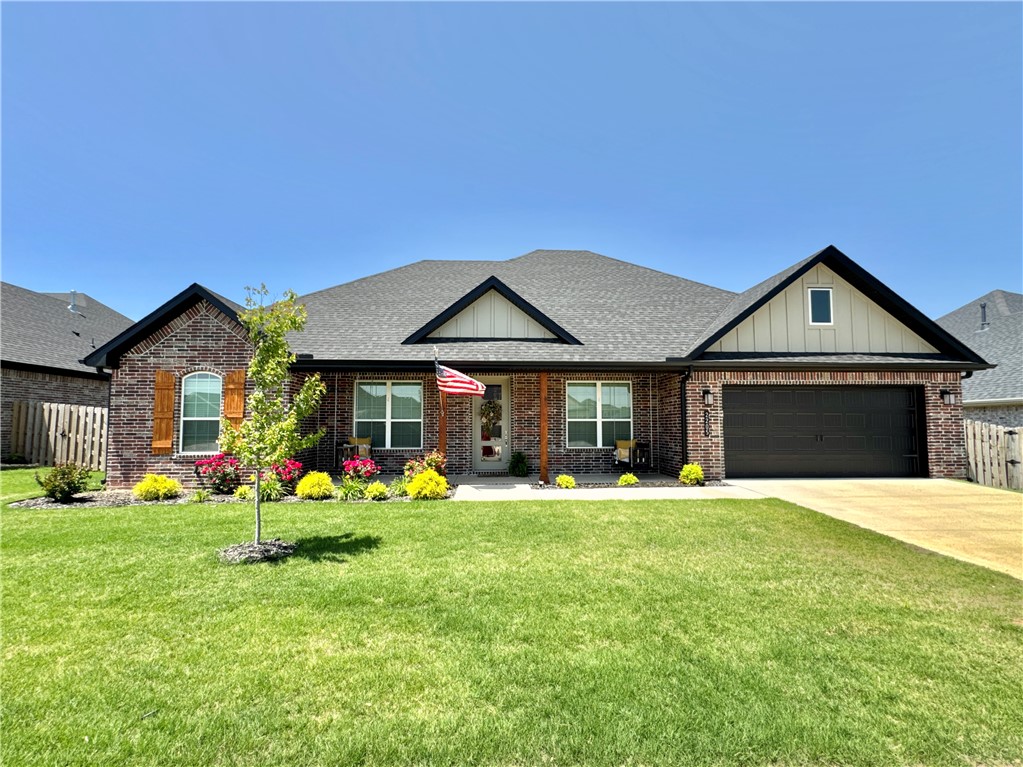 Welcome to this beautiful home in the highly sought-after Arlington Subdivision of Pea Ridge! Conveniently located across from Pea Ridge High School & offering easy access to all of Northwest Arkansas, this home is perfect for modern living. The home is 2,081sqft w/ 4 beds/2 baths. From the moment you step through the spacious entryway, you’ll be captivated by the details throughout—including the exposed wood beams. The open, split floor plan offers a seamless flow between living spaces. A well-appointed eat-in kitchen includes bar seating. The formal dining room features a tray ceiling that adds a touch of elegance. Retreat to the primary suite complete w/ a spa-like bath, featuring dual vanities, a whirlpool tub, walk-in closet, & separate shower. The large laundry room offers practicality & style w/ a built-in bench & storage. Outdoors, enjoy relaxing evenings on the welcoming front porch w/ two charming porch swings, or entertain guests in the expansive backyard under the covered back porch w/ roll down shades.