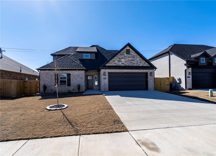 Brand-new construction in the highly desirable Walnut Grove Estates in sought-after Bentonville. This 4-bedroom, 3-bath home is just minutes from Vaughn Elementary School, XNA Airport, shopping, dining, and everyday conveniences. Thoughtfully designed w/ quality finishes throughout, the home features wood flooring in the main living areas and primary suite, granite countertops, custom cabinetry, built-in appliances, & a spacious kitchen island. A floor-to-ceiling stone fireplace highlights the living room, & ample closet space adds functionality. The primary suite offers a relaxing retreat w/ a soaker tub, custom tile shower w/ dual shower heads, and an oversized walk-in closet. Fence, blinds, and gutters are included in the purchase price. Future neighborhood amenities include a pool, walking trails, fishing ponds, and additional POA features. Seller is offering $10,000 toward closing costs, rate buy-downs, or appliance upgrades, plus preferred lender offering up to $3,500 toward rate buy-down or closing costs.