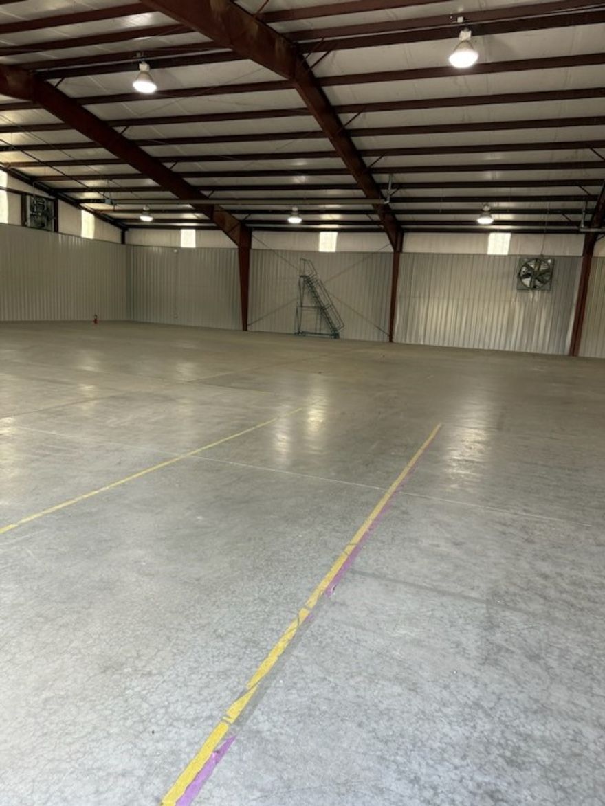 Excellent warehouse space. Close to I-49 and HWY 412.  Space has two dock high doors and a drive in door.  Also has about 900 (mol) square feet of office space with two bathrooms.