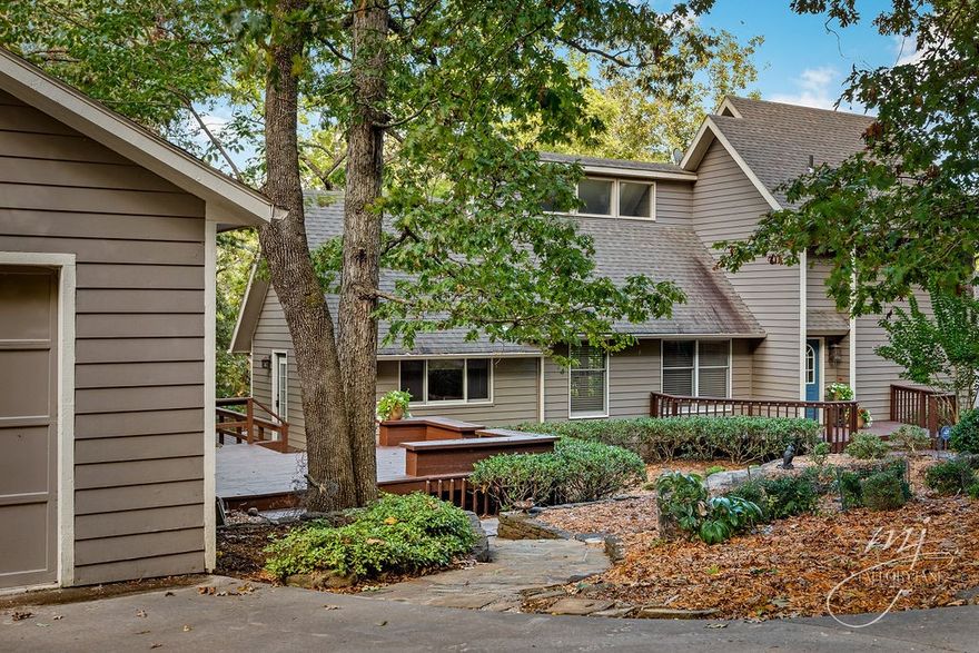 Lakefront Home with Private Boat Dock, much sought after property on Beaver Lake due Corp announcing no more boat dock permits issued on Beaver Lake at beginning of 2021. Contemporary in style with recent custom upgrades to Kitchen and all 3 baths.  28x32 oversized two car detached garage.  Easy walk down lakefront.  Main Bedroom Suite on main level of home. Home on two lots for privacy. Nicely landscaped yard with party deck.  5 bedrooms and 3 full baths makes this a true family get away retreat. Starkey Marina nearby for pizza on the deck or watercraft rentals. Kitchen upgrades w a special Advantium oven that acts as a microwave that cooks your food to programmed perfection. Tons of storage. Woodburning fireplace in Living Room for cozy winter afternoons.  Home designed for lots of natural lighting and open spaces. Nice Concrete RV pad next to garage with hookups. Redwood painted siding. See Sellers' feature sheet.