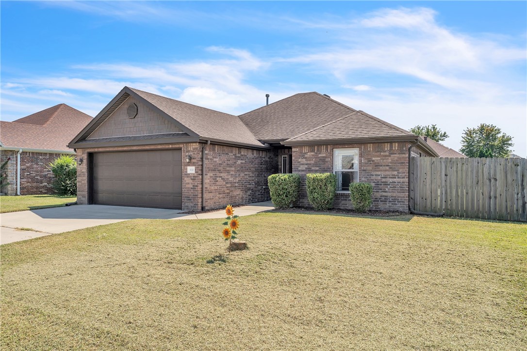 This is a truly amazing, well-kept, and affordable all brick home in a great location! Open the front door, and you're greeted by new LVP flooring throughout. The large, open living room features a vaulted ceiling with custom crown molding. Fresh paint in modern colors adorns the walls, offset by a stunning wood and tile framed gas fireplace. The living room opens to the large kitchen with tons of storage. Loads of cabinets and granite countertops, pantry, stainless appliances, and dining area. The primary bedroom features a tray ceiling with crown molding, an ensuite with dual vanities, and a huge walk-in closet. The split floorplan features two more large bedrooms for the kids and their own bathroom! Out back, the kids and dogs can play in the huge, flat, fenced backyard while you relax under the covered back patio. This home won't last long at this price, so call your agent today to schedule!
