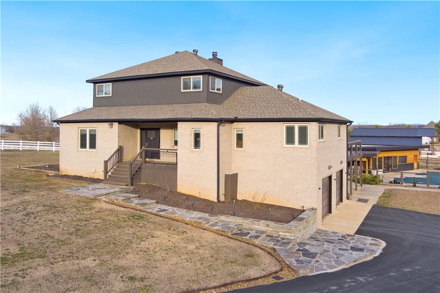 Live large in this country estate property on 5 acres of flat land w/ space to enjoy the outdoors. The split floor plan home boasts 4,544 sf w/ impressive features as cathedral ceilings, bamboo flooring, & massive double-sided fireplace. The outdoor amenities are equally impressive, w/ inground pool area, pool house, playground area, and stocked pond. The pool house is plumbed for gas stove, has bathroom w/ walk-in shower, & covered patio space great for entertaining guests. For those who enjoy working on projects, the 56x52 shop w/ a 16x50 lean-to & chicken coop is sure to be a favorite feature. Workshop has tons of shelving, a convenient walking plank and rolling ladder, half bath, & automotive utility carousal that provides functionality. If you're in the market for a spacious and comfortable country estate, this property is the best choice!