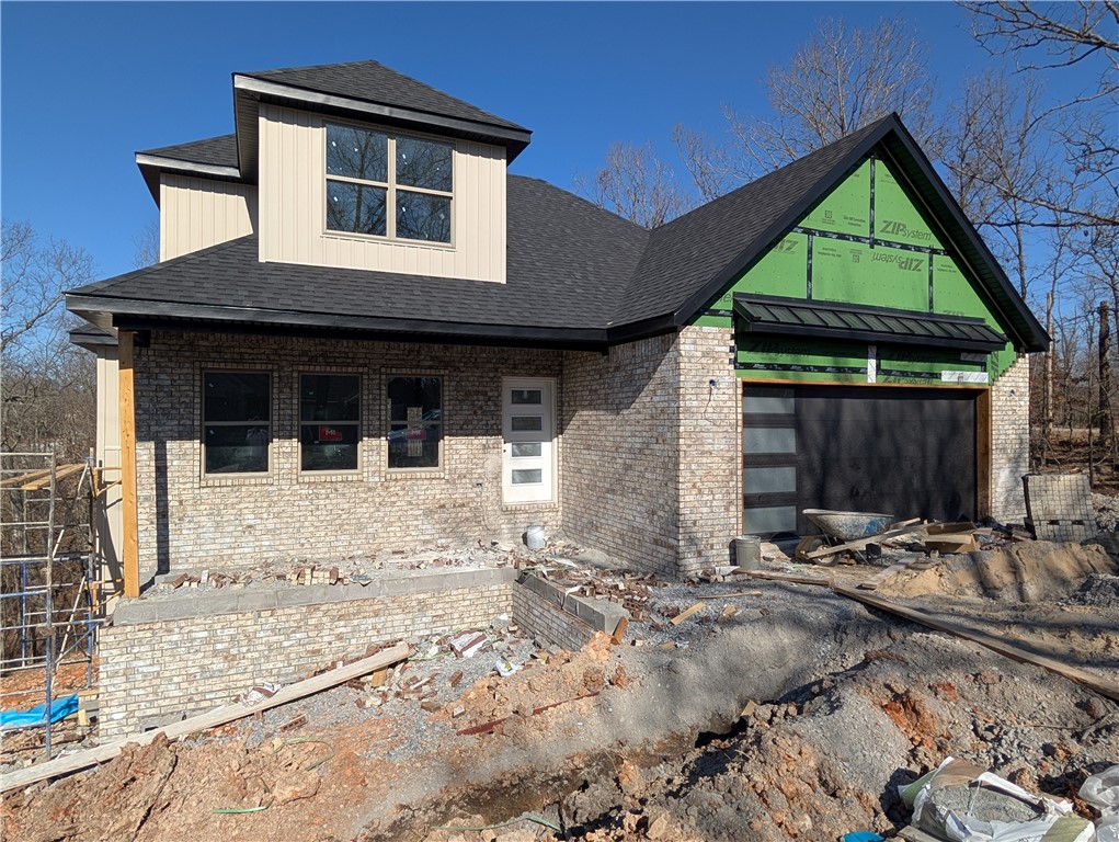 Welcome To Your Next Home! Another New Plan For Bella Vista And It's A Winner! Great Curb Appeal And Location Situated Just Down From MTB Trail Access And Close To Lake Brittany And Golf. Connected To City Sewer. Bentonville Schools. Main Level Offers An Open Living w/ Fireplace, Spacious Kitchen And Dining, Primary Suite, Laundry/Utility, And A Half Bath. Custom Cabinets And 3cm Granite Counters Throughout. Walk-in Closet Off Primary; Dual Vanity, Full Custom Shower In Primary Bath. Upstairs Offers 3 Secondary Bedrooms + Fully Bath. Nice Storage Throughout Home. Covered Front Porch And Back Deck. Still Time To Make Selections. Make Sure This One Is On Your List!.