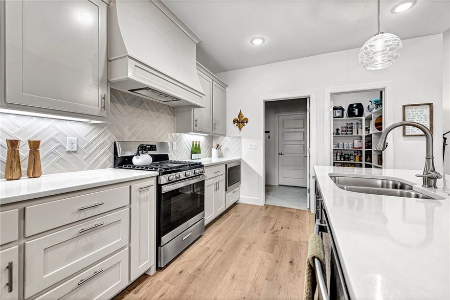 NEW PRICE! Welcome to 3 McKissick, an almost new 3-bedroom, 2-bath home nestled in a quiet cul-de-sac and surrounded by a peaceful wooded setting in Bella Vista. The flat, usable backyard is a perfect spot for morning coffee, evening relaxation, or entertaining. Inside, natural light fills the open-concept floor plan, showcasing hardwood floors and a spacious living area designed for both everyday living and entertaining. The spacious primary suite serves as a private retreat with a large walk-in shower and walk-in closet, while the secondary bedrooms provide flexible space for family, guests, or a home office. Conveniently located with easy highway access and close to premier walking and biking trails, this home puts you minutes from Bella Vista’s sought-after amenities, including pools, golf courses, parks, and community events. Combining comfort, privacy, and convenience! Up to $2,000 in Preferred Lender Credits – Make 3 McKissick Yours!