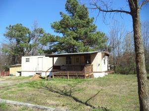 Affordable home in the country. 2 bedroom. Fenced yard,shed and pond.
