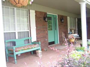 COVERED BOAT SLIP ON PINEY BAY WITH LIFT, comes with the Custom built home. Yes, 4 Bedroom, 2 bath home completely repainted, new duct work for NEW Central Heat & Air heat pump. HUGE covered patio deck in back, hardwood floors, cathedral ceilings in the Living Room with a Tray Ceiling in the Kitchen. Fenced back yard, storm cellar and beautiful landscaping. Double car garage attached plus 2
