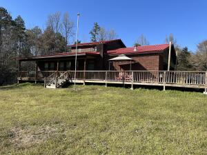 Quiet, Rustic, & Private Home on 13.97 M/L Acres, Fenced Pasture with a Stocked Pond, over 2000 sq ft 3 BR 2 Bath Home with a Man Cave/Den AND a Bonus Room, 2 Car Garage, Huge Front Porch, Large Shop, and Outbuildings, Cedar Lined staircase & Cedar Handrail. It is a good mix of woods and pasture for a great mini farm. This property is located just off Mill Creek And for all the Avid Fisherman, Access to Lake Dardanelle is Less than 3 miles away. Lake Dardanelle is a 34,300-acre reservoir on the AR River. It is located only 8 miles to Lake Dardanelle State Park for lots of fishing, hiking, swimming, picnics, or camping. Call today for a showing!!!