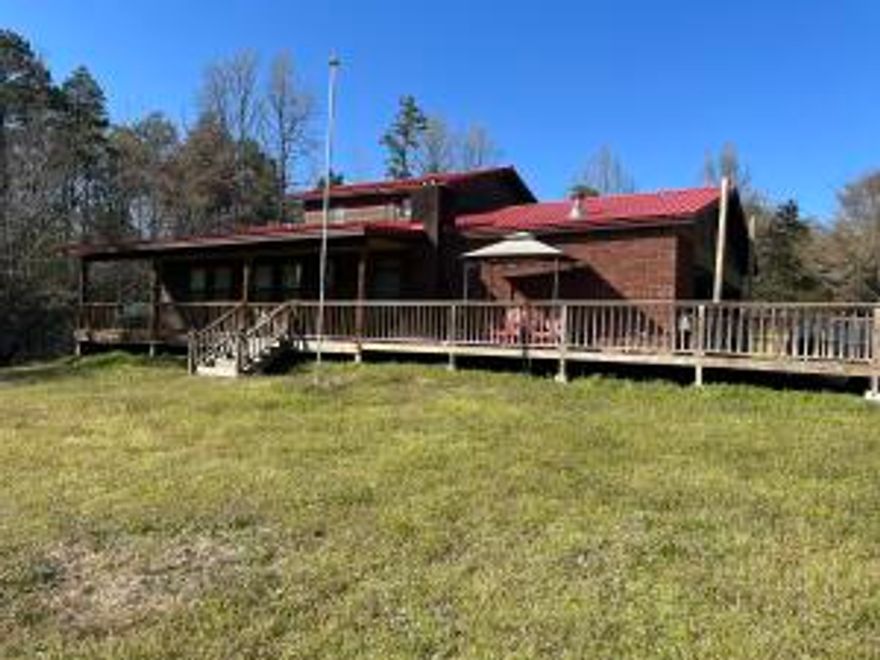 Quiet, Rustic, & Private Home on 13.97 M/L Acres, Fenced Pasture with a Stocked Pond, over 2000 sq ft 3 BR 2 Bath Home with a Man Cave/Den AND a Bonus Room, 2 Car Garage, Huge Front Porch, Large Shop, and Outbuildings, Cedar Lined staircase & Cedar Handrail. It is a good mix of woods and pasture for a great mini farm. This property is located just off Mill Creek And for all the Avid Fisherman, Access to Lake Dardanelle is Less than 3 miles away. Lake Dardanelle is a 34,300-acre reservoir on the AR River. It is located only 8 miles to Lake Dardanelle State Park for lots of fishing, hiking, swimming, picnics, or camping. Call today for a showing!!!