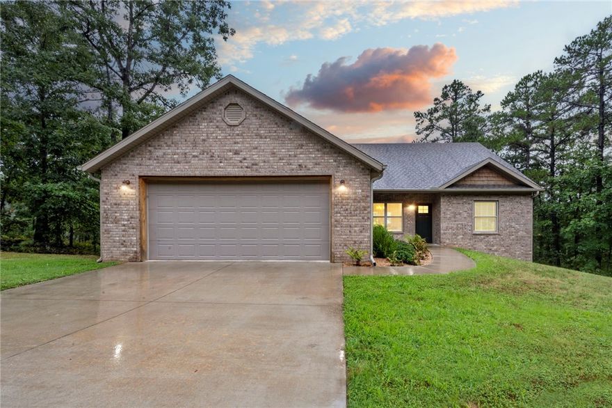 The story of 17943 Antler Ridge is unsurpassed quality. Set on a spacious (just under 2 acres) and heavily wooded setting, come and see this special home.   The 12-15 minute drive from downtown Rogers along Scenic Hwy 12 is just long enough to decompress from a long day.   Featuring an open floor plan, vaulted ceilings, stunning kitchen, spacious laundry room with sink, lots of pantry space, large walk in closets, master suite and so many other custom features. Constructed with 2x6 exterior walls, poured concrete foundation walls, an oversized garage and a huge workshop/storage area in the basement (not included in sq/ft). Extra wide doorways and openings for handicap accessibility.  This one owner home is ready for it's next family.  It could be you.