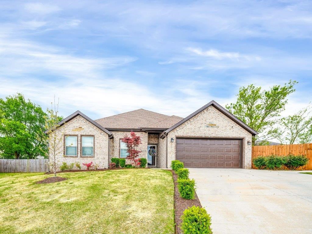 Enjoy your spacious backyard all year under your large covered patio! Home upgrades: irrigation system front & back as well as french drains, Nest thermostat, smart home with security, Frigidaire Gallery appliances, hardwood vinyl for easy cleaning in living area and bedrooms. Great location!