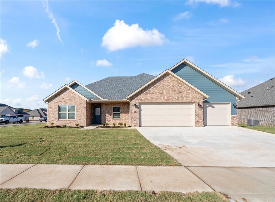 Beautiful new construction with a 3-car garage in a sought-after neighborhood! This quality-built home features an open layout with a vaulted ceiling and gas log fireplace in the living area. The kitchen offers white cabinetry with soft-close doors and drawers, quartz countertops, stainless steel appliances including a 5-burner gas range, a walk-in pantry, and under-cabinet lighting. The Ownerās Suite boasts a double vanity, soaking tub, large tiled shower, and a spacious walk-in closet.. Durable wood-look tile flooring extends through the main living areas, with carpet in the bedrooms. Energy-efficient upgrades include solar decking in the attic. Outside enjoy a covered patio, full sod, gutters, blinds, and a fully fenced yardāready for move-in. Conveniently located near schools, parks, and restaurants, this home checks every box!