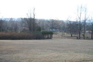 This piece of property of 4.89 m/l acres is near Shoal Bay and the Arkansas River. Land is partially cleared in which it has septic, electric and water available on it.