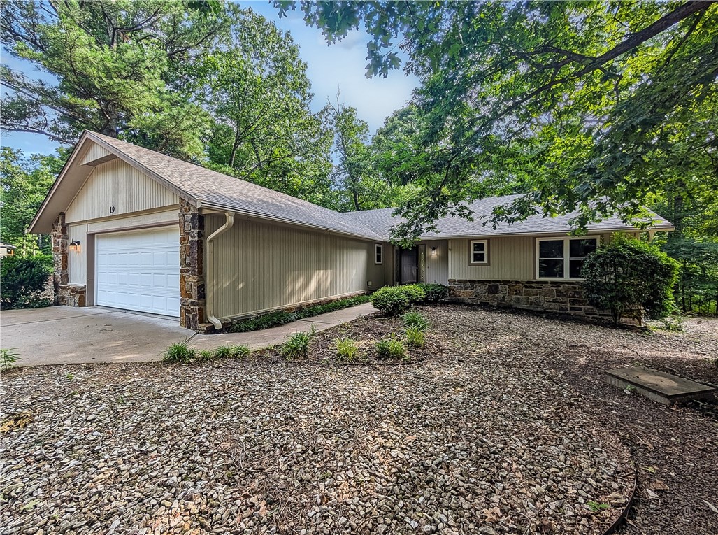 Welcome To Your Next Home! Brand New Roof? Check. Nearly Half An Acre Of Park-Like Vibes On A Corner Lot? Double Check. This Fantastic 2 Bedroom + Office + Sunroom Gem (1565 Sq Ft Main + 194 Sq Ft Sunroom) Brings The Charm, The Space, And The Bella Vista Lifestyle You’ve Been Looking For. Tucked Just Steps From Trails And Amenities, This Home Features High Ceilings, An Open Living Area With A Cozy Rock Fireplace, And A Split Floorplan That Just Makes Sense. The Kitchen Offers Bar Seating Plus Eat-In Dining, And Every Room Feels Generously Sized. The Sunroom Is Your New Favorite Spot — Morning Coffee, Plant Paradise, Or Bonus Lounge Time — Your Call. Out Back, A Peaceful Deck Overlooks Nature And Feels Like A Daily Getaway. Nicely Updated And Low-Maintenance Inside And Out. There’s A Lot To Love Here — Come Take A Look! ***3rd Room To Be Considered Office/Bonus Or Other Non-sleeping Room. 2 Bedroom Septic. Buyer To Sign Off On Understanding Of Such.