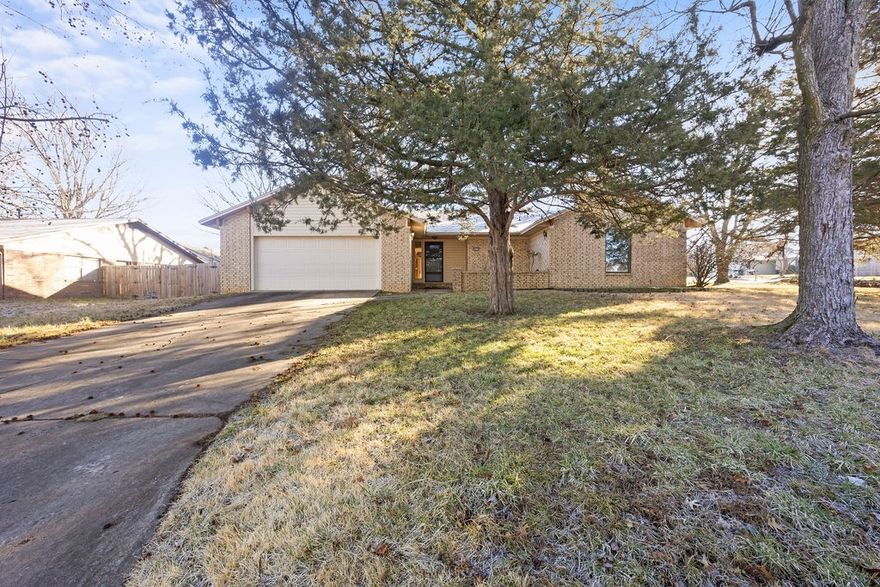 $5000 seller credit included to use towards whatever buyer wants! Fully renovated midcentury modern house. Around 7 minute Walking distance to Gulley Park for the kids and trails to bike/walk/run on! New water heater and roof. Come see the stainless steel appliances, big farmhouse sink, and washer/dryer included in the sale. If you have any pets, let them enjoy the fully privacy fenced backyard with a covered patio and fire pit! Attached two car garage with attic storage. Close to great restaurants and 5 minutes to the Walmart neighborhood market! Beautiful marble waterfall countertop in kitchen. Around 10 minutes to the University of Arkansas. Currently occupied. This property has been a great investment property for 3 years+. Please do not disturb tenant. Agent Owned