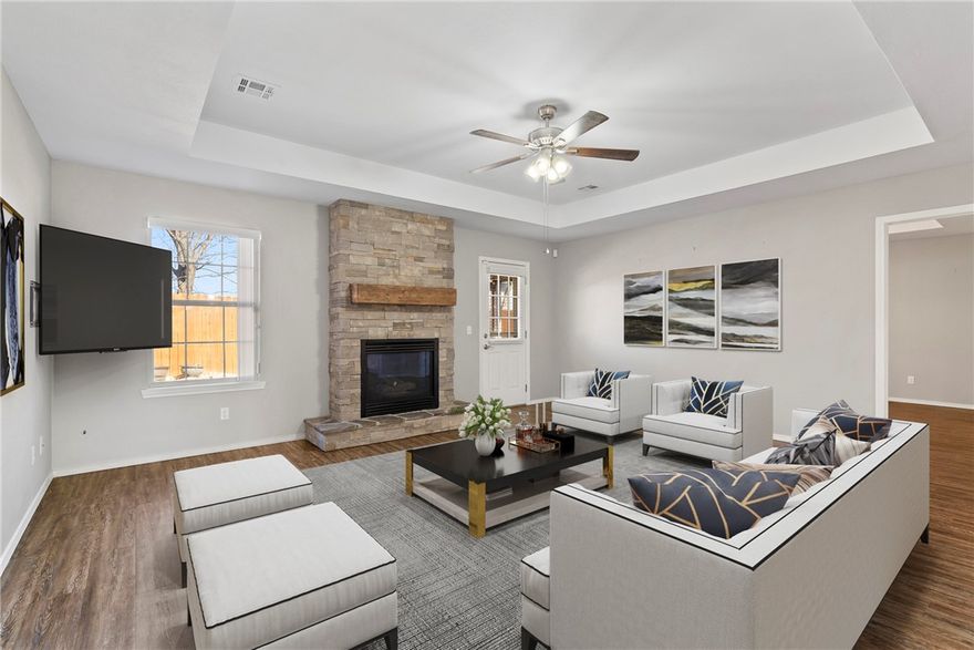 Easy living with elevated style! This split floorplan 3BD, 2BA remodeled home offering 1,659 sq ft has it all. Brick exterior provides timeless curb appeal, while durable LVP flooring runs throughout the entire. The living room features a cozy gas fireplace, TV mount & tray ceiling. Stainless steel appliances in the galley style kitchen, granite countertops & dual pantries. Formal dining area that's open to the living room. The primary suite has a tray ceiling, dual vanities with granite countertops, a jetted tub, a tile shower & a large walk-in closet. Step outside to the covered back porch with a metal pergola, perfect for outdoor gatherings in the privacy-fenced yard. You can activate the already installed ADT Security system & utilize the 6-person below-ground storm shelter in the garage.  Home is close to schools, shopping, restaurants & everyday amenities. Seba Bike Park, Cornerwoods Park & Keller Road Dog Park is just down the road. Roof around 6 years, HVAC 2024, water heater-2017. Maintained perfectly!