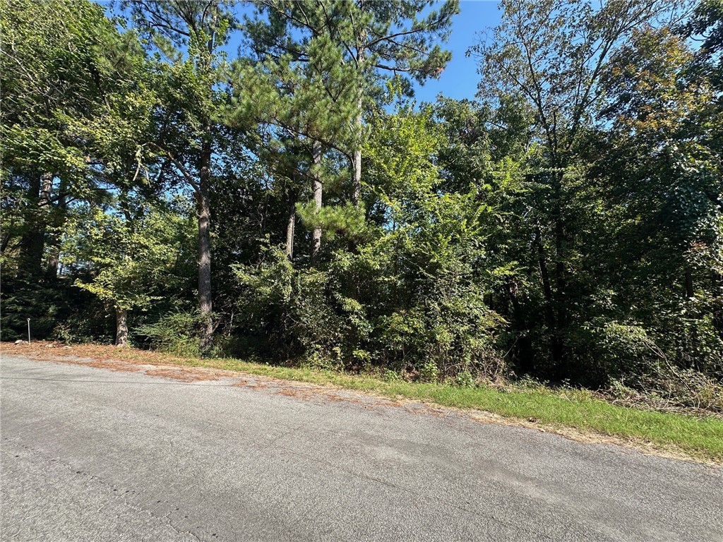 0.35(+/-) lot. Seller had property perked for a 3-bedroom home. Generally flat off the road then slopes in the back. This gently sloped property offers a perfect setting for your dream home with easy access to boating and fishing.