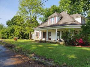 FIXER UPPER Looking for a handy man special then look no further. Wrap around porches and tall ceilings is all part of what you get with this diamond in the rough. Home sits on a corner not in a quiet neighborhood in Atkins. 3 BR 1 BA Come check in out before its gone.