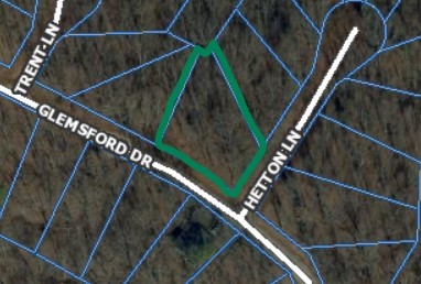 1.3 miles away from a Back 40 Trail Head off Lancashire! Bentonville Schools. Clean and maintained street with new construction homes. Large corner lot that is as flat as a Bella Vista lot can be. Ravine on the back side will give great privacy from any back yard neighbors.
