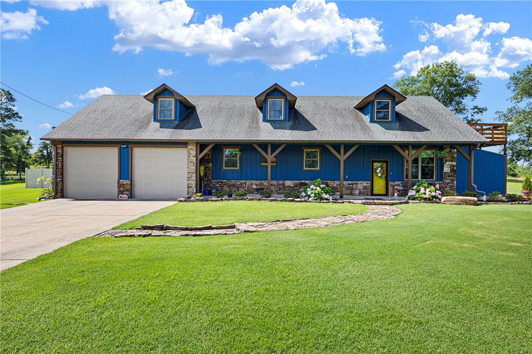 Welcome to your private sanctuary! This beautifully maintained home offers over 2,400 sq ft of living space, featuring 3 generously sized bedrooms and 3 full bathrooms, perfect for comfortable family living or entertaining guests. Lying on just under 5 pristine, manicured acres, the property combines open space with mature landscaping and thoughtful outdoor amenities. Inside, the living area is accented by eye-catching beam work, creating warmth and rustic elegance. Step out onto decks at both ends of the home, ideal for morning coffee or evening relaxation, overlooking your own private oasis with a stunning inground pool, complete with a poolside cabana—perfect for summer gatherings or a peaceful afternoon escape. Need space for projects or storage? The 20x30 shop offers plenty of room for hobbies, equipment, or even a home-based business. Located just off Crow Mountain, this property offers the best of both worlds: a serene rural setting with convenient access to town. This is more than a home, it's a lifestyle.