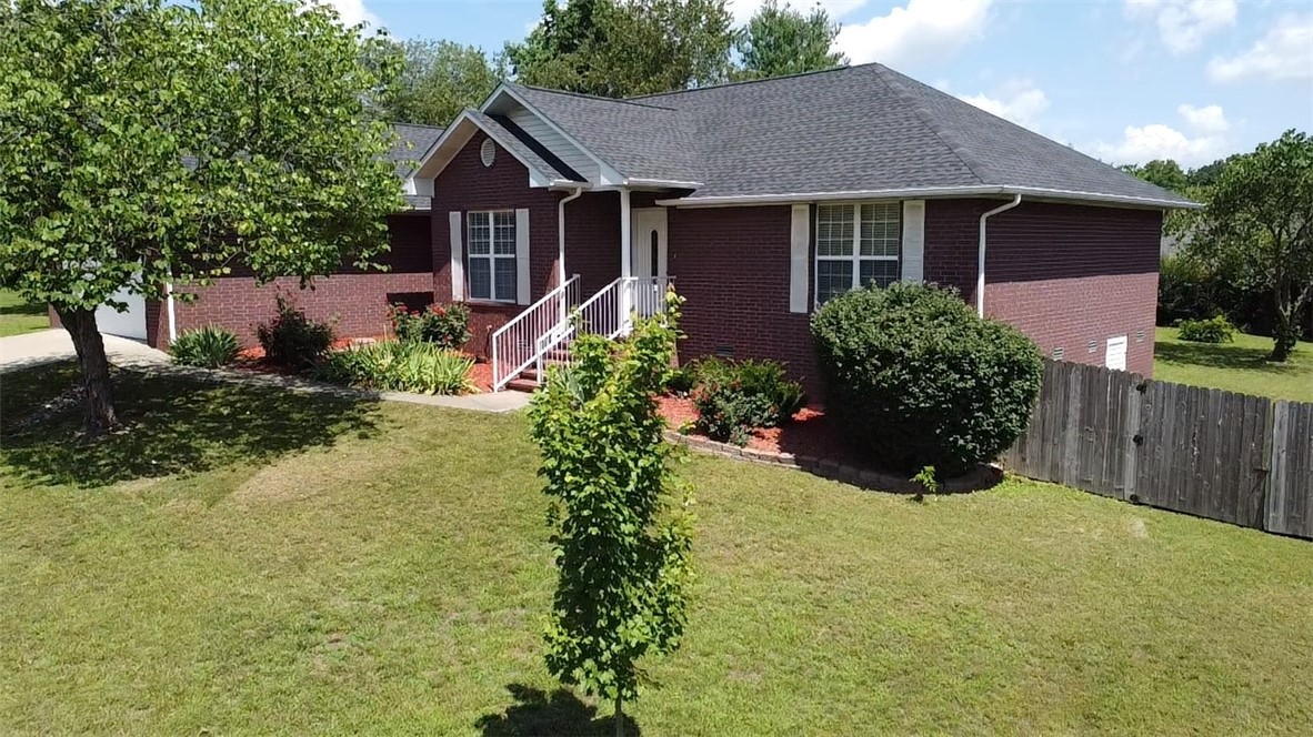 All Brick home situated in a well established neighborhood. 3 bedroom, 2 full bath, split bedroom floor plan, with formal dining, gas log fireplaced, hardwood, carpet & title floors. Lovely back yard, wood privacy fence. Level yard. Just waiting for you! Harrison School District. Just minutes to Downtown Harrison, Buffalo River or Branson MO