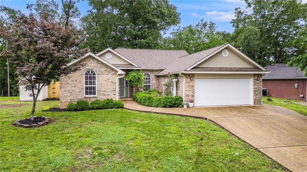 Welcome to 7 Chudleigh Lane. Perfectly situated with quick access to Blowing Springs Trails, the Bella Vista Recreation Center, shopping, and Mercy Medical Center, this home combines comfort, functionality, and a prime location in one great package. Step inside to find a warm and inviting living room, featuring a propane fireplace for cozy evenings and built in storage for showcasing your favorite decor. The spacious and bright kitchen flows seamlessly into a roomy dining area, creating an ideal space for entertaining or casual family meals. Off the kitchen, the utility room with extra storage leads directly into the attached 2-car garage—a convenient layout for everyday living.
Retreat to the master bedroom where you'll enjoy private access to the back patio and a generously sized master closet offering abundant storage. Out back, your very own firepit area awaits—sure to become a favorite spot for relaxing or gathering with friends and family under the stars.
Don’t miss the opportunity to call this home yours!