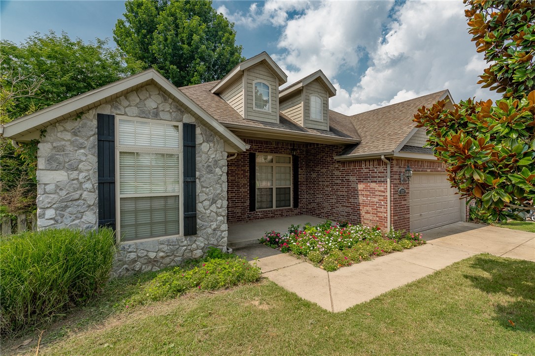 4 bed/2 bath plus breakfast area & formal dining room. Split floorplan, open kitchen/living area plus the front bedroom makes a great office. Shady backyard with a large deck. West Fayetteville location, zoned for Farmington Schools. Finishing up new paint throughout, newer wood flooring in dining, living & kitchen, carpet in bedrooms. Large roll up door on the back of the home for storage. Stainless appliances with new fridge, washer and dryer included. Granite counters with plenty of cabinets including a pantry cabinet and lazy Susan in the kitchen.