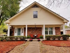 No showings until Monday August 5.What a find... 3bedroom 2 bathroom with chain link fenced yard. This home has nice space in the house and sits on 2 lots. There is a storage building and the screened in porch is amazing. Take a look, you will be glad you did.