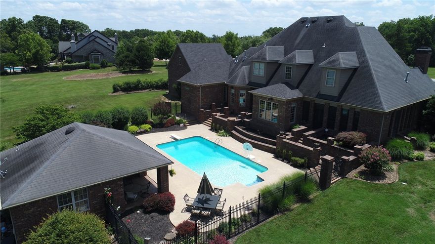 Expanded and renovated Estate on 4(+/-) private acres! Smart floor plan great for entertainment! New detached 2 car garage offers living quarters for Nanny or in-laws. Pool house with kitchen, storm shelter, movie room, game room, cozy screened in porch with fireplace. 2 new HVAC systems 2013, new water heaters, dishwasher and fridge. Invisible fence.