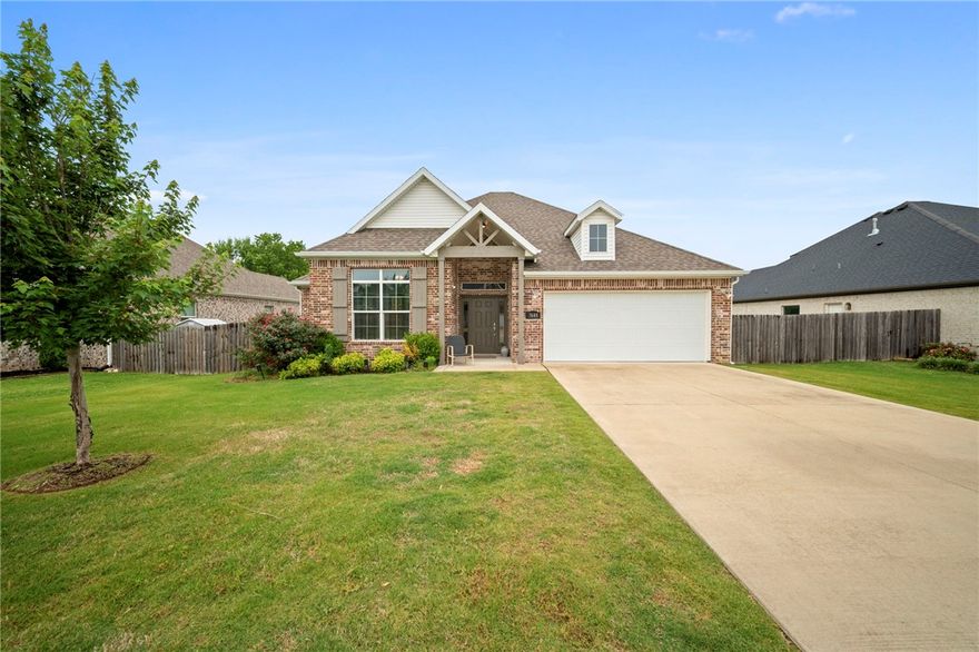 Hot new listing located right by Shaw Park and centrally located to all that Northwest Arkansas has to offer. This adorable home offers 3 bedrooms, 2 baths, and a large bonus room upstairs. The home boasts hardwood flooring, wood beams in living area and master bedroom, granite countertops, SS appliances, gas range, walk-in closets throughout, and a cozy gas log fireplace in living room.  This home backs up to a field for the ultimate privacy factor! You don't want to miss out on this jewel, priced to sell! This area is booming and highly desired.