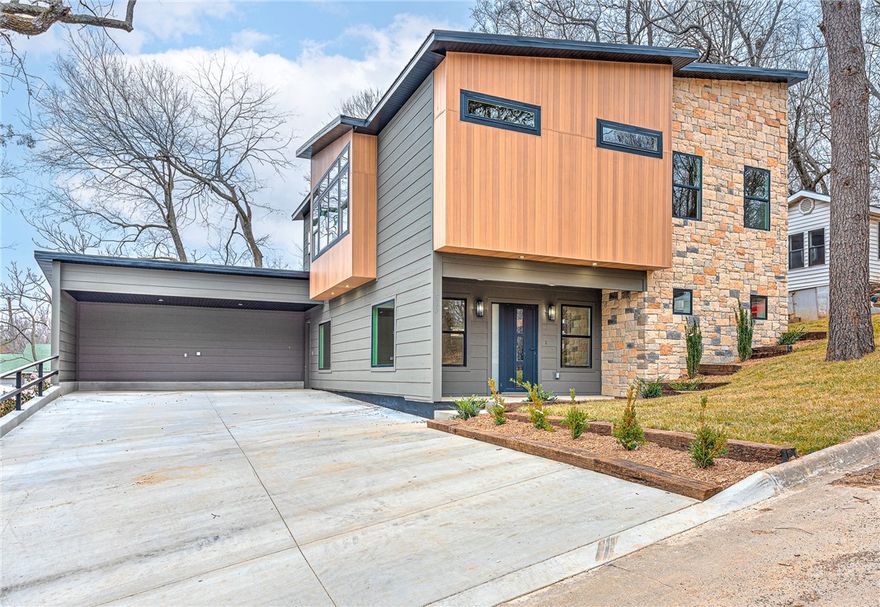 Welcome to this beautiful new 4-bedroom, 2.5-bath home, where modern design meets energy efficiency in one of South Fayetteville's most desirable neighborhoods.  Inside, an open floor plan invites natural light, creating a seamless flow between living, dining and kitchen areas.  
Every detail has been thoughtfully designed to combine sleek aesthetics with warm, inviting, touches.

The home features striking modern design with clean lines and highend finishes, all while incorporating energy effecient features that reduce your carbon footprint and ensure year round comfort.  Whether you're entertaining or enjoying a quiet moment, this space is both sophisticated and livable.

Located near local shops, dining, parks and trails, this home allows for easy access to everything Fayetteville has to offer. Take advantage of this rare opportunity to own a home that blends modern style, creaftmanship and unbeatable location.