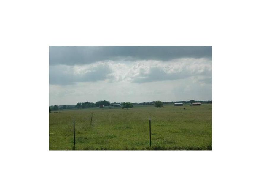 Take advantage of this hard to find acerage in Springdale! Bank owned lot at the intersection of Don Tyson Parkway and Butterfield Coach Rd. This location has easy access and high traffic counts throughout the day. Would be a great location for development. All city utilities are currently available.
