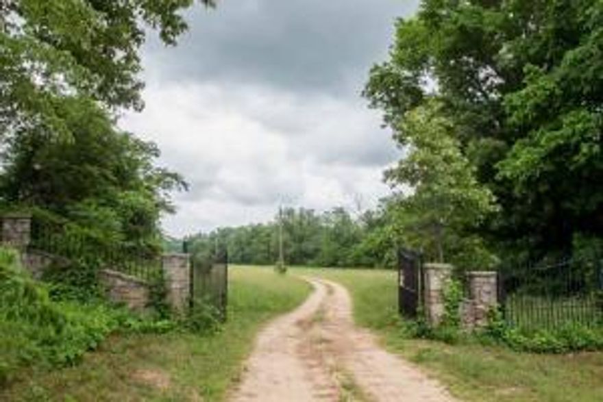 Wow! Hunter or Ranchers dream property. Gated entrance! Clear Creeks runs the entire property. Glencoe Springs runs along the side of property, cave, springs, pasture land, hay fields, ponds, 40X120 Pole Barn. Corrals, loading chutes, medicine and feed room. Deer paradise. Lots of Wild Turkey and Quail. Cute 2 bedroom farmhouse with well water. Fruit orchard. 2 mi from Hwy 65.10 miles from Buffalo