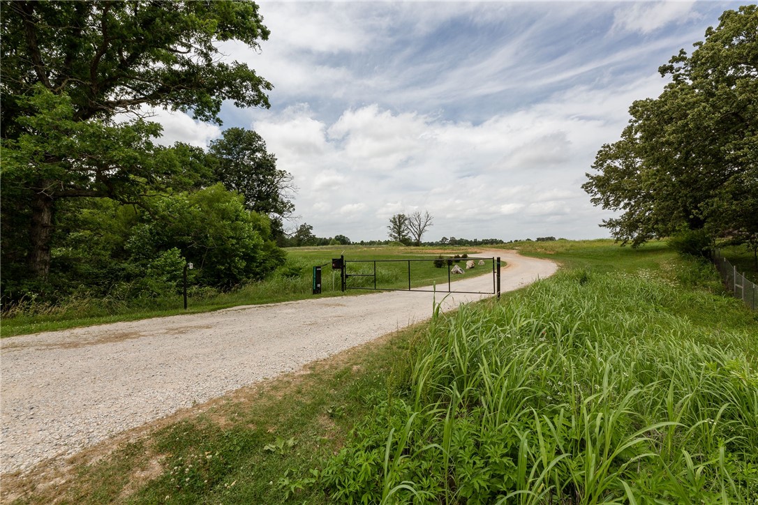 Custom built house and 25 X 40 shop has 11.10 ft X 18.6 ft Office with HVAC. Deer hunting, trail riding on this 31.94 acre Estate. This Estate only 1.8 miles from Hwy 265 runs from Rogers to Fayetteville so own your own piece of NWA within minutes of all restaurants, shopping, and Arts this all in a hideaway from the hustle and bustle of the rest of NWA.