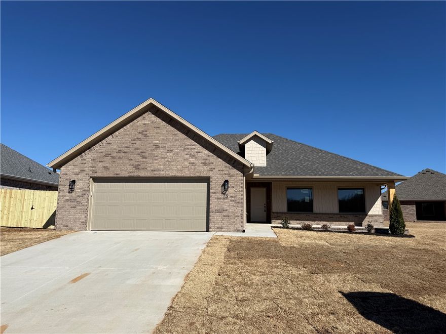 Location, Location, Location, Walking distance to Creekside Park and just minutes to I-49 or the University of Arkansas. This beauty has a large, inviting front porch and a brick exterior with siding accents to make it very maintenance. Great open layout but it still has defined spaces to make it very functional. Primary suite has double vanities. The guest bathroom is oversized with double sinks.