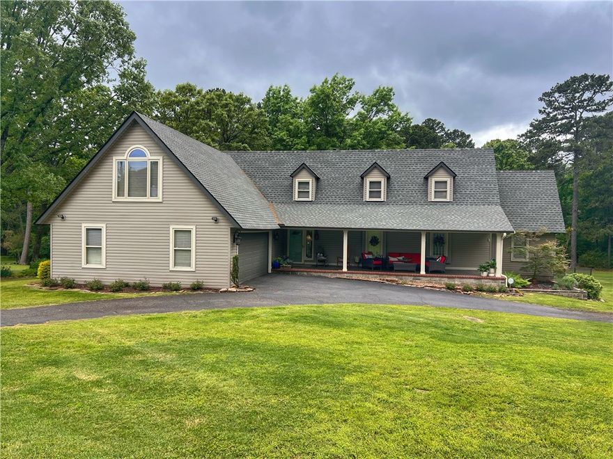 Absolutely Beautiful home in West Russellville on a large lot with a very private backyard.  Incredibly well maintained with plenty of updates.  Each bedroom has its own full bath, plus there is a half bath down stairs.  Enjoy watching the sun rise from covered front porch, and then enjoy the sunset on the oversized back patio which is also covered.  So much beauty!