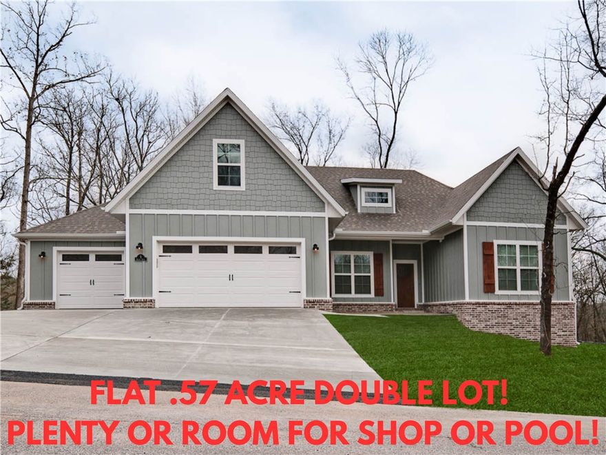 Check out this stunning new construction home on a FLAT .57 acre double lot! Plenty of room for an inground pool or shop.  Less than 5 minutes from Branchwood Recreation Center and nature trail. WOOD FLOORS THROUGHOUT! (NO CARPET) 3 car oversized garage! With 4 bedrooms and a bonus room complete with a full bath, there's plenty of space for everyone. The vaulted living room features beautiful beams and elegant wood floors, adding to the home's charm. The kitchen showcases custom cabinets, premium black stainless steel appliances, a gas range, and 3 cm quartz countertops throughout. Retreat to the primary bath, which offers a luxurious large walk-in tile shower, a free-standing tub, and generous closet space. Huge covered back patio! Quick access to I-49, Lake Loch Lomond,  and Highlands Golf Course. This home perfectly balances tranquility and accessibility. Plus, take advantage of $3,500 in buyers closing costs, courtesy of the builder's preferred lender!