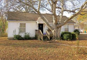 Spacious house on a large corner lot located in W. Russellville. Investors and first time home buyers need to take a look at this 3 bedroom 2 living room house. A little work and this place could look great!