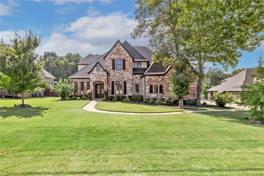 Settle into warm luxury in this expansive home located on a park-like 1 acre lot in the coveted Chapel View Subdivision. This home offers plenty of room for living, working, & entertaining with 5 bedrooms, 2 office/flex rooms, ample storage, great outdoor entertaining space & a beautiful 40X20 ft heated gunite pool. Delight in the custom finishes that give this modern home character with gorgeous wooden built-ins & brick accent wall in the living room, wooden beams & coffered ceilings, wainscoting, butler's pantry, wine fridge, & lots of other great details throughout. The beautiful chef's kitchen checks all the boxes with a large granite island, gas rangetop, stand alone double oven, pot filler, & large pantry. The spacious primary suite on main level offers a retreat like ambiance with a stand alone tub, floor to ceiling tiled shower room, & two large closets. This functional floorpan includes 4 bedrooms & 2 full baths upstairs. Joyful living awaits. Don’t miss the opportunity to call this exceptional home yours!