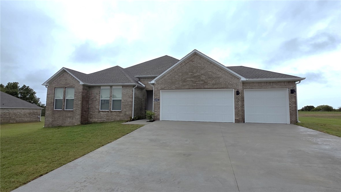 Sold before print! Exquisite Eureka plan with a 3-car garage in Monitor Meadows, where you'll experience modern luxury in Lowell, Arkansas. Our meticulously crafted floor plans provide ample space for you to grow and thrive. Bedroom 1 will have a fan and your fabulous ensuite will have an oversized walk-in shower, elongated commode and quartz counters. You'll find fantastic quartz counter tops also in the kitchen with tile backsplash and 42-inch upper cabinets. Black plumbing fixtures throughout! LED lighting throughout! Living room will have a fan and a modern electric fireplace with a poplar mantle.