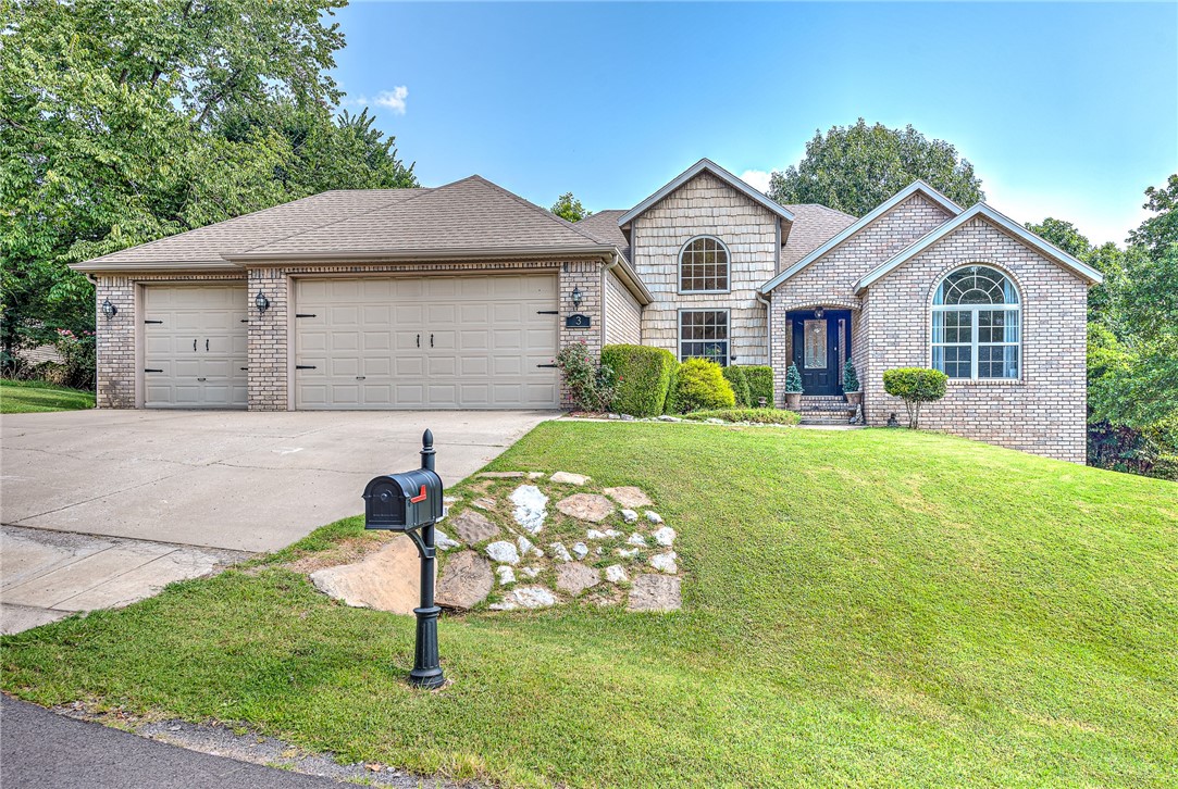 Charming 3 bed, 2 bath home with approx. 1,633 SqFt on a .31 acre cleared lot, featuring an oversized 3-car garage. The home offers a split floor plan, large windows, crown molding, formal dining, and a cozy gas/propane fireplace in the living room. The kitchen boasts granite countertops & abundant cabinet space,Bathrooms include European vanities,New flooring in the master, living room, and hallway. Enjoy the outdoors with a backyard deck, manicured yard, mature trees, rose bushes, and a small fenced side yard perfect for pets. Updates include new gutters, partial patio replacement, HVAC (2017), and septic serviced in 2024. New roof to be installed before closing(buyer chooses shingle color)! Located near mountain bike trails and the future Ozark Trail Bike Park. Just 30 mins to the new Walmart Home Office and downtown Bentonville. Bella Vista POA amenities include lakes, pools, fitness center, golf, tennis, and pickleball. Lot #30 is also available. Call for more info.