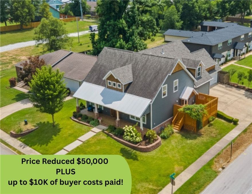 NEW PRICE PLUS seller offering up to $10,000 toward buyer closing and lending costs! Authentic Craftsman charm meets modern luxury in this stunning 4-bed, 4-bath home with bonus room in downtown Bentonville. Thoughtfully designed with rich wood flooring on the main level, warm beams, custom built-ins, and stained-glass detailing at the entry. The chef’s kitchen features granite countertops, farmhouse sink, dual ovens, and walk-in pantry. The primary suite offers a spa-like bath with soaking tub, walk-in shower, stained concrete floors, and private deck with hot tub. Upstairs includes 2 bedrooms, 2 full baths, and a giant bonus room—ideal as media, playroom, or 5th bedroom. The lower level offers a custom wine cellar, tasting room, and fitness room. Outdoor entertaining space completes this one-of-a-kind home near the Square, Crystal Bridges, Razorback Greenway, and Bentonville public schools. Don’t miss this rare opportunity for style, comfort, and convenience in the heart of downtown Bentonville!