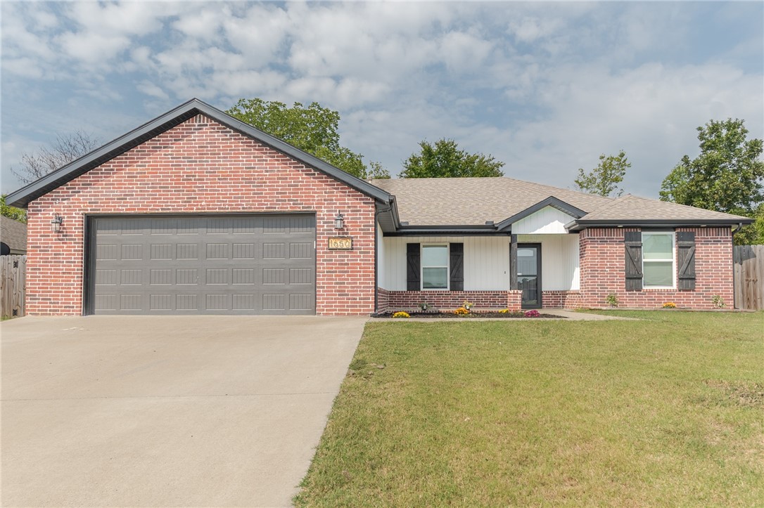 Great home in Prairie Grove with large open living area and split bedroom plan has fresh interior paint. Nice utility room and pantry. Primary bath and guest bath have beautiful tile showers. Fresh front landscaping. Storage building.