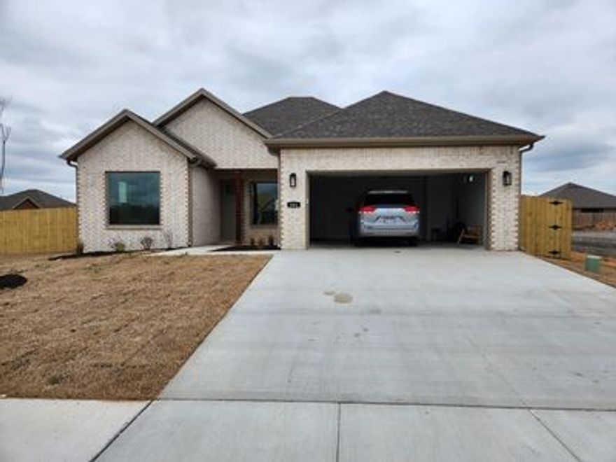 Newer construction. 3 bedroom 2 bath in Hilldale. Modern open floor plan. Easy access to schools, shopping, restaurants, downtown Bentonville and the new Wal-Mart Campus. Large privacy fenced yard with covered patio. EV charger provided in garage. Refrigerator, washer and dryer provided for tenant convenience. Pets considered with increased deposit. All adult applicants must complete application. $50/person to apply. Tenant occupied. 24 hr notice to show. Property owner will execute lease and manage property once tenant is approved.