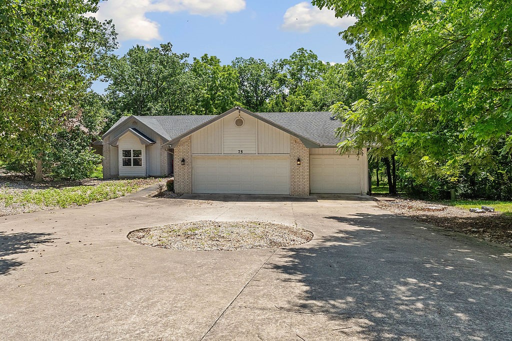 Lake living at its finest on Loch Lomond! Welcome home to 3BD/3BA property with office & downstairs bonus room offers an easy, level entry and a gentle walk to the water. Enjoy your own covered boat dock and a low-maintenance rock yard. The vaulted ceilings and open layout connect the living, dining, and kitchen areas ā complete with granite counters, custom island, and extra storage. Take in serene lake views from the 4-season enclosed porch or the spacious back deck overlooking the level yard. The walk-out basement includes a 3rde bedroom and bonus space/second family room. Updated primary suite features a walk-in shower, whirlpool tub & dual vanities. 3-car garage, walk-through laundry access to the kitchen on primary floor. Whether boating, relaxing, or entertaining, this lakeside retreat has it all!