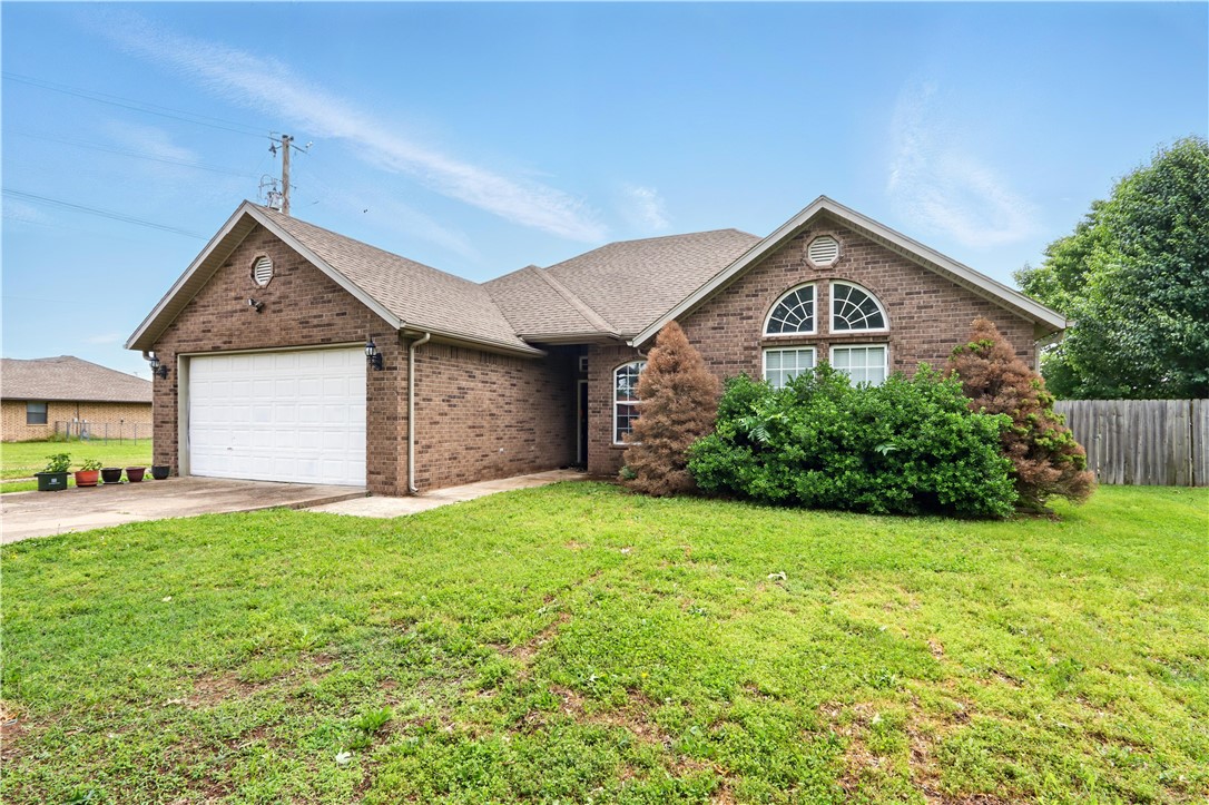 Beautiful home nestled right off city limits of Lowell, AR. Convenient location just a short distance from interstate I-49. Enjoy the country leaving feel of this home with a large front and back yard for those beautiful summer days. This home features a 3 bedroom 2 full baths on .06 of an acre lot. This is a rare find close to town. Schedule your private showing today!
