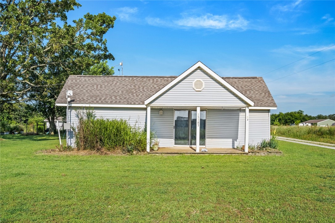 Don't miss this opportunity to own a farmhouse on over 3 acres in the heart of Gravette! This peaceful property offers room to roam with a perfect balance of country living and everyday convenience.
3+ acres of usable land (subject to lot split), spacious detached garage/workshop, covered front porch perfect for relaxing, mature trees and open green space.
Enjoy quiet country living with space to grow—bring your vision and make this beautiful property your own!