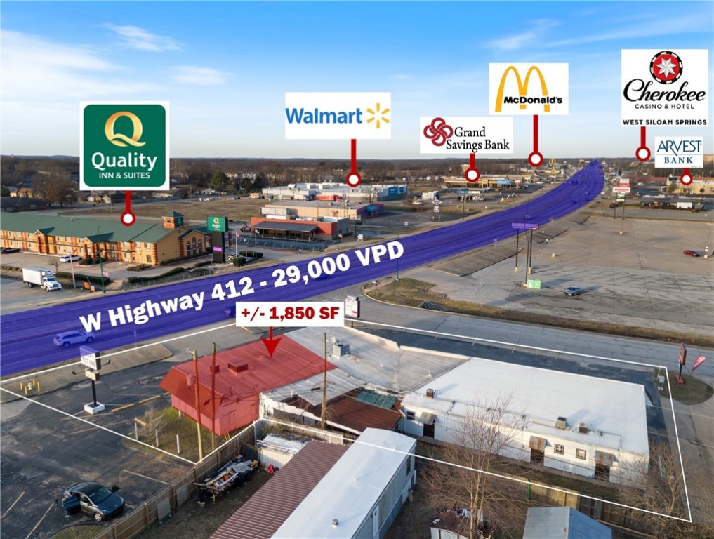 +/- 1,850 SF retail/office space fronting US-412 in Siloam Springs, offering prime visibility and accessibility. This suite is currently being utilized as a barber shop/tattoo studio. Positioned at the intersection of US-412 (29,000 VPD) and Dogwood St (1,700 VPD), this location ensures excellent exposure. Additionally, it is less than a half mile from Walmart Neighborhood Market, and surrounded by major national retailers such as Harbor Freight, Dunham's Sports, KFC, Sonic Drive-In, O'Reilly Auto Parts, and more. This is a fantastic opportunity to establish your business. Offered on a modified gross lease, tenants are responsible for their own electric and gas, plus $150/mo for water and trash.